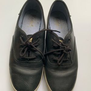 Black leather Keds